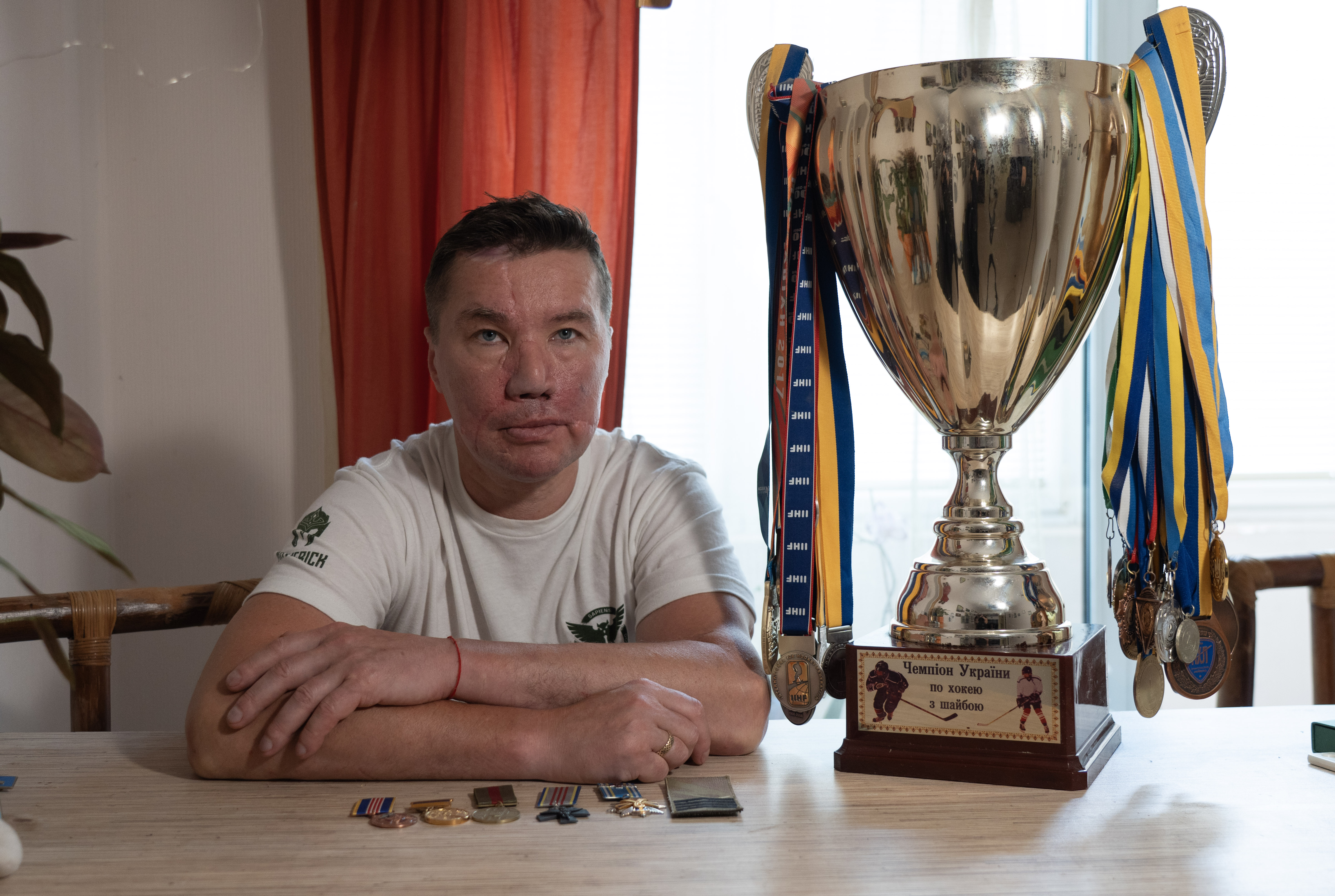 He spent years playing and coaching hockey alongside Russians. Then Putin invaded Ukraine