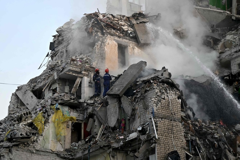 Russian air assault on Kyiv kills 13, dozens injured