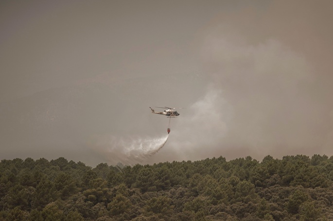 Wildfires advance toward Bordeaux in France, devastate central Spain