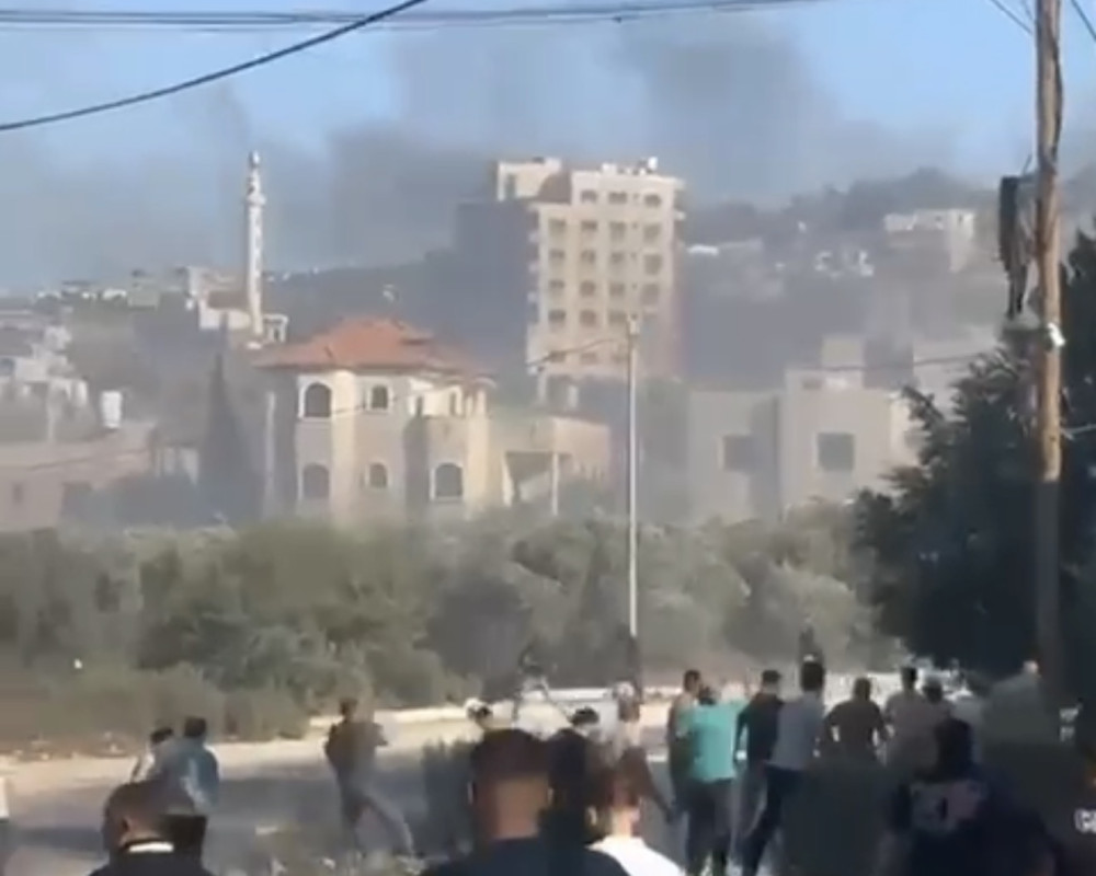Homes burned, residents injured in wave of settler attacks across West Bank