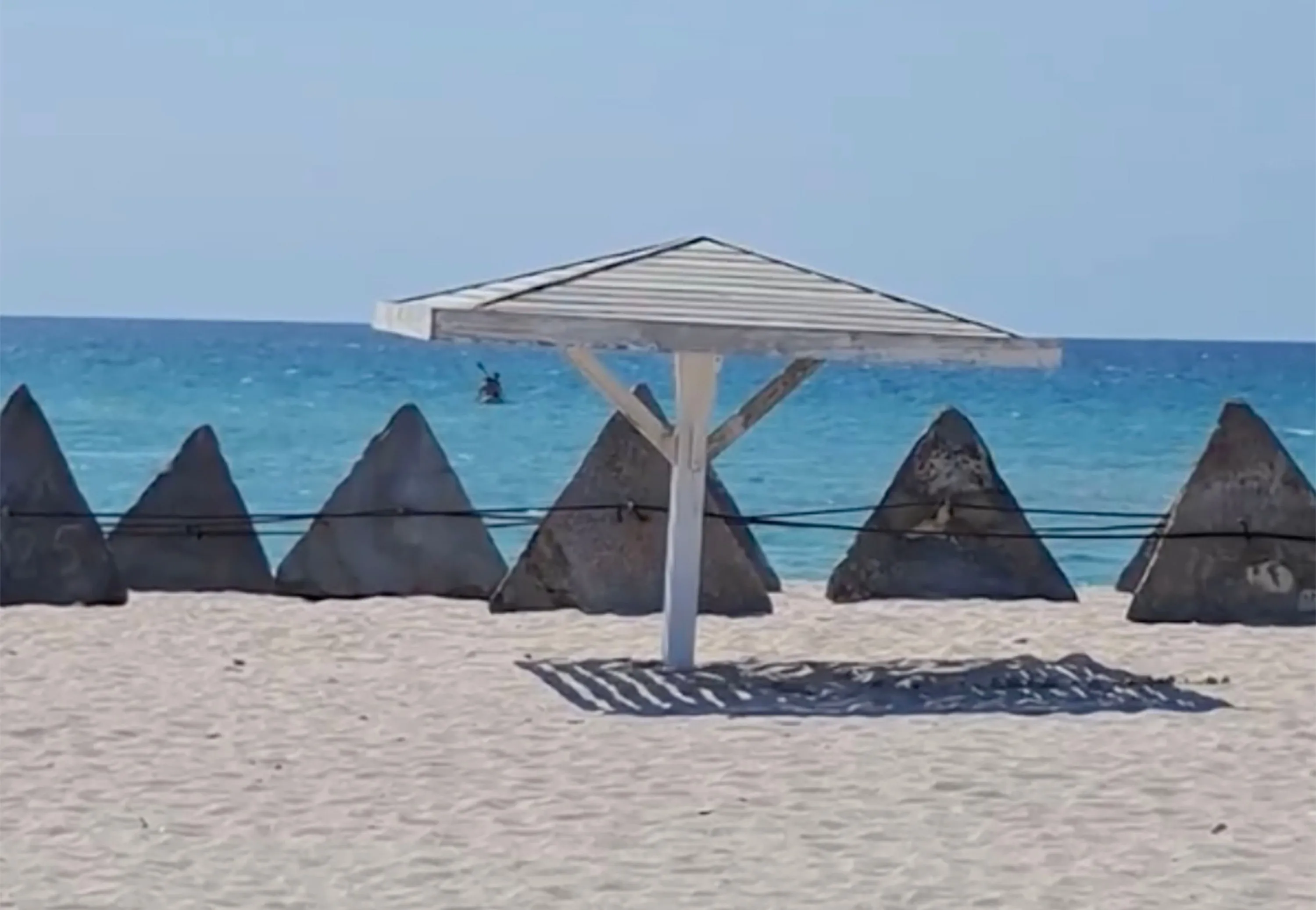 Tourist beaches lined with chilling ‘Dragon’s Teeth’ tank defences as paranoid Putin fears liberation landing in Crimea