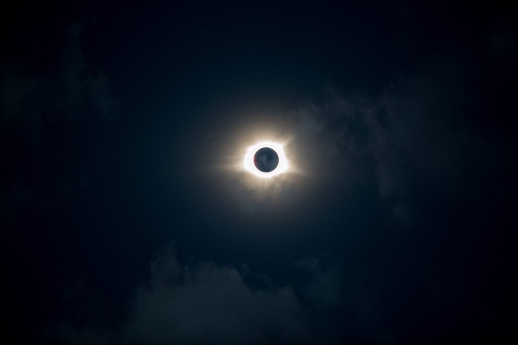 Total solar eclipse plunges cloudy Iceland into darkness