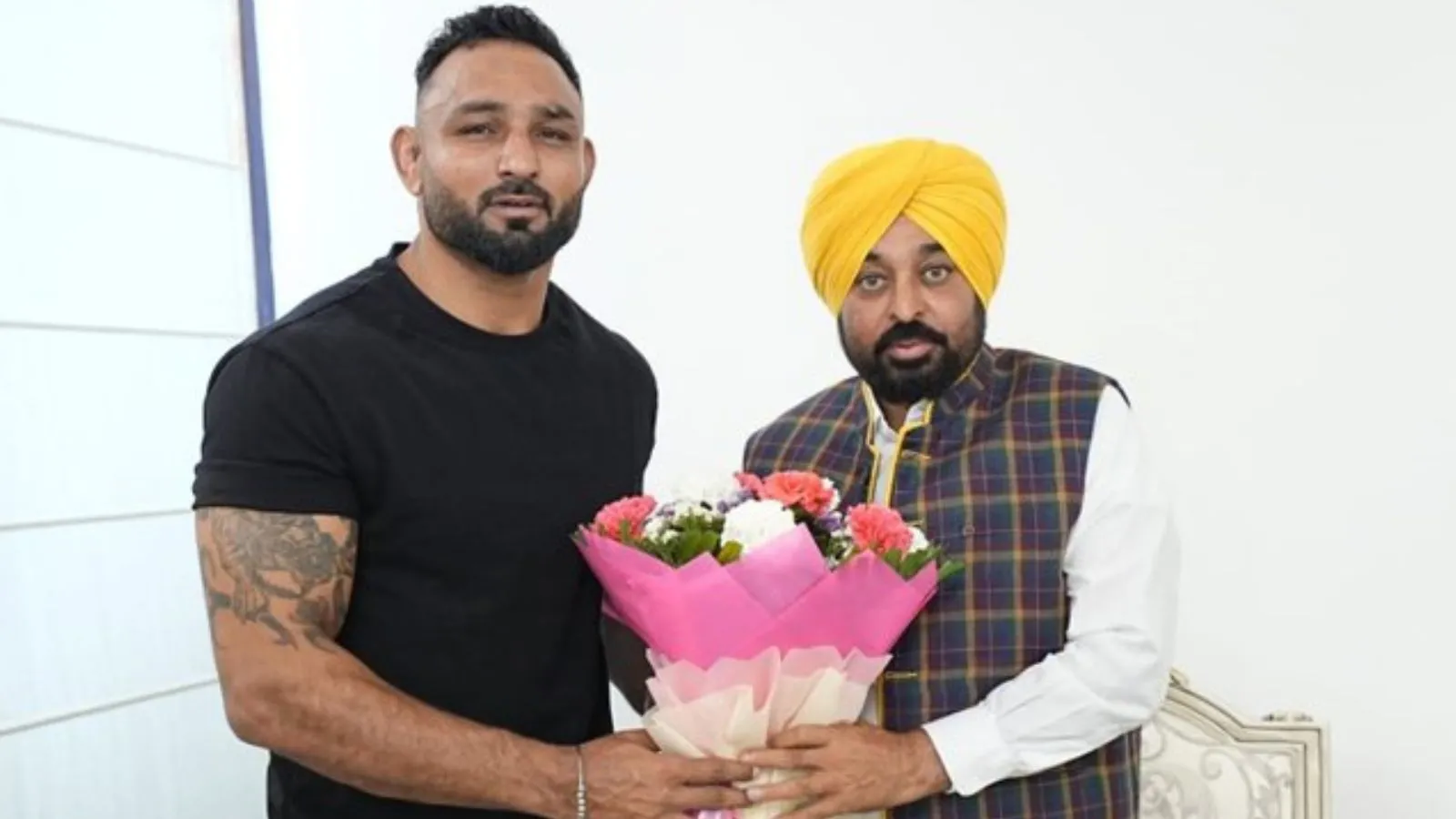 Day after MPs’ defection, Bhagwant Mann inducts Pala Jalalpuria, ‘Salman Khan of kabaddi’, into AAP