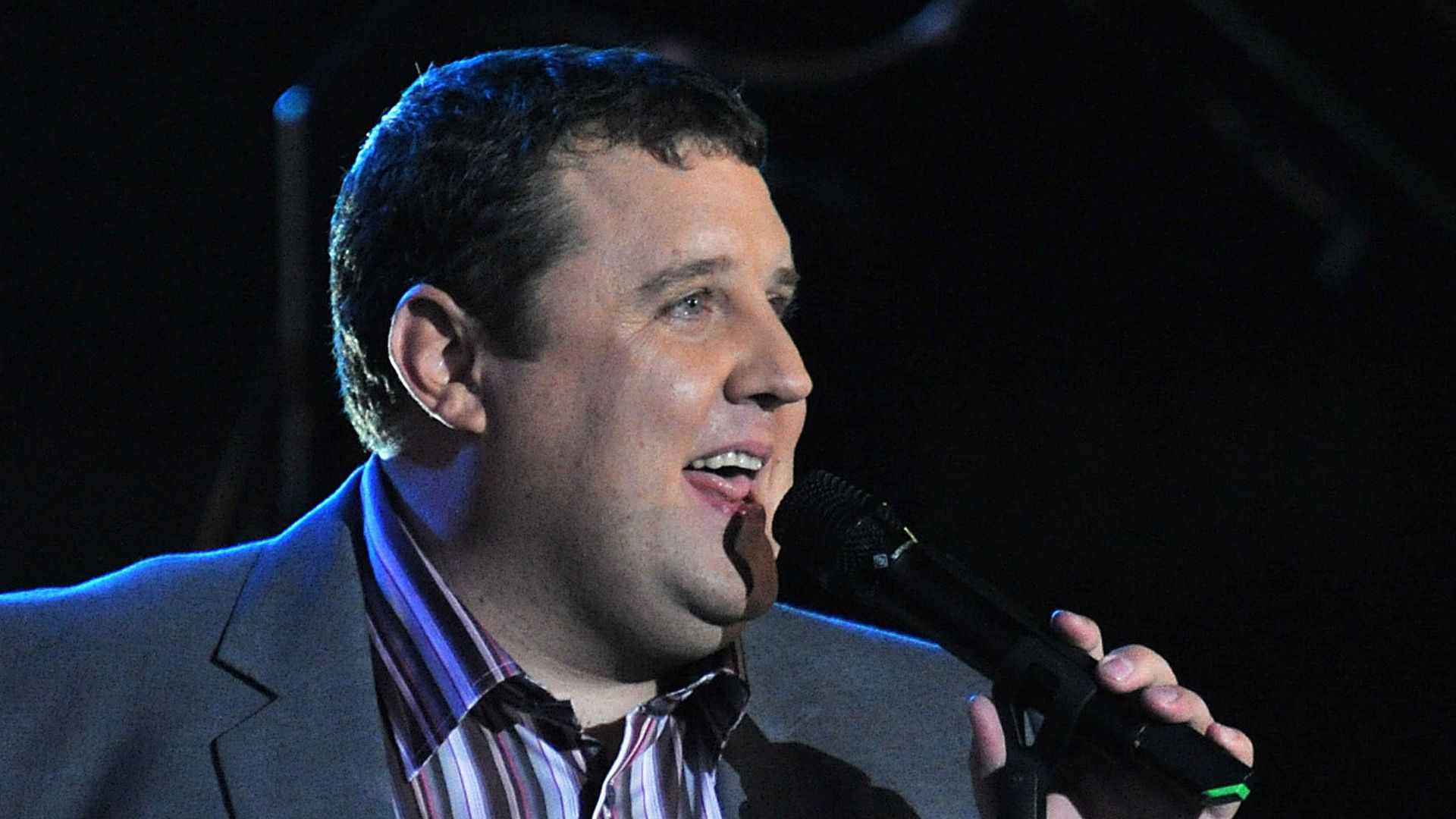 Teenager charged after bomb hoax at Peter Kay show